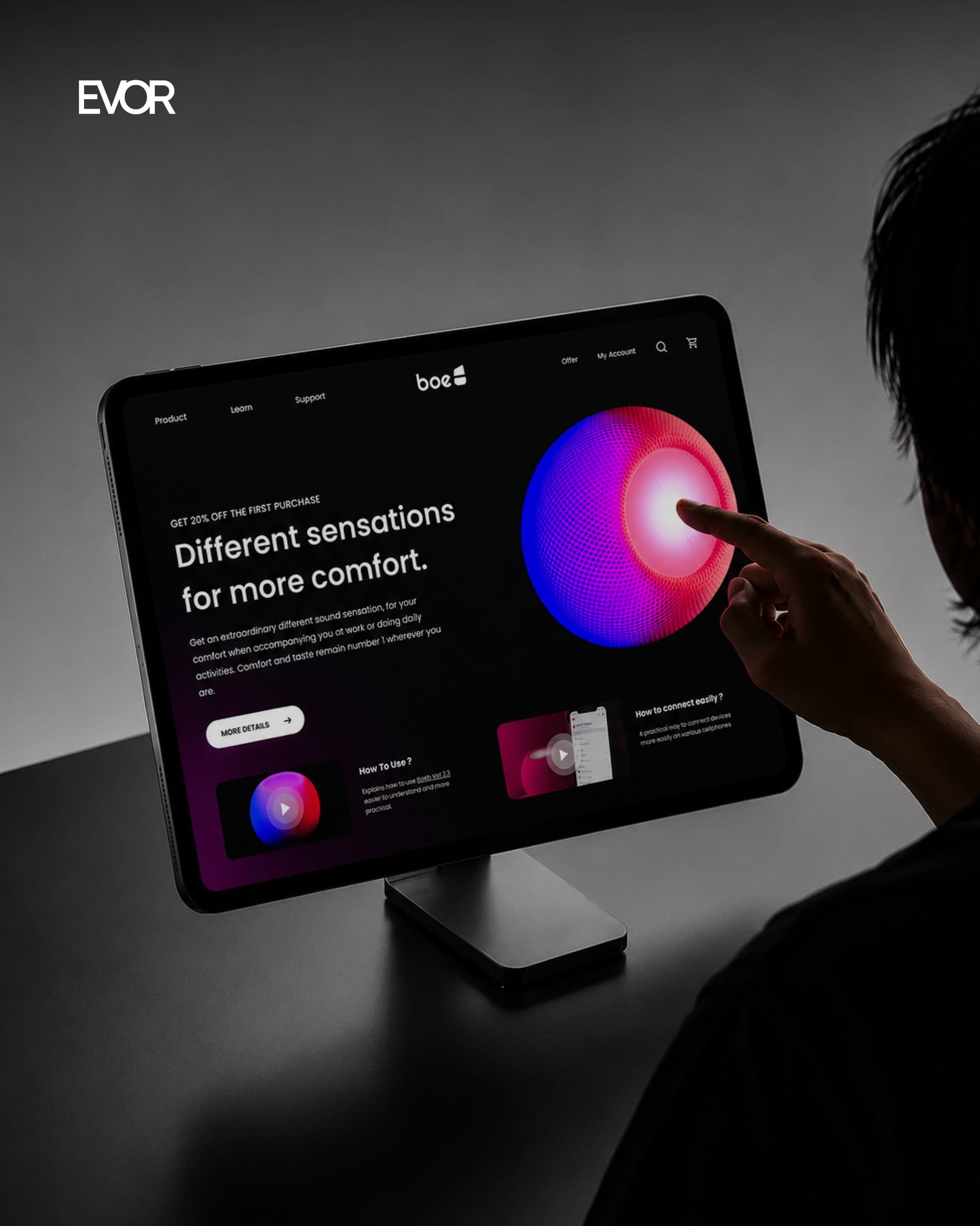 Boe cover: the product page on a desktop display, a hand reaching to touch the speaker on screen.